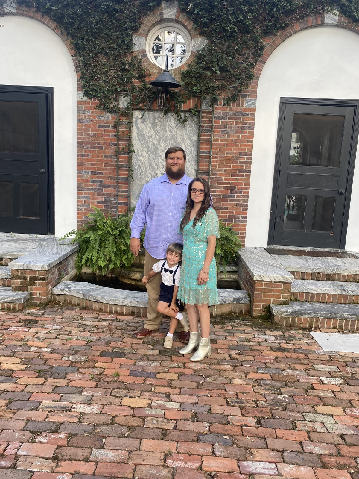 The Mitchell family — Mitch, his wife, and their son